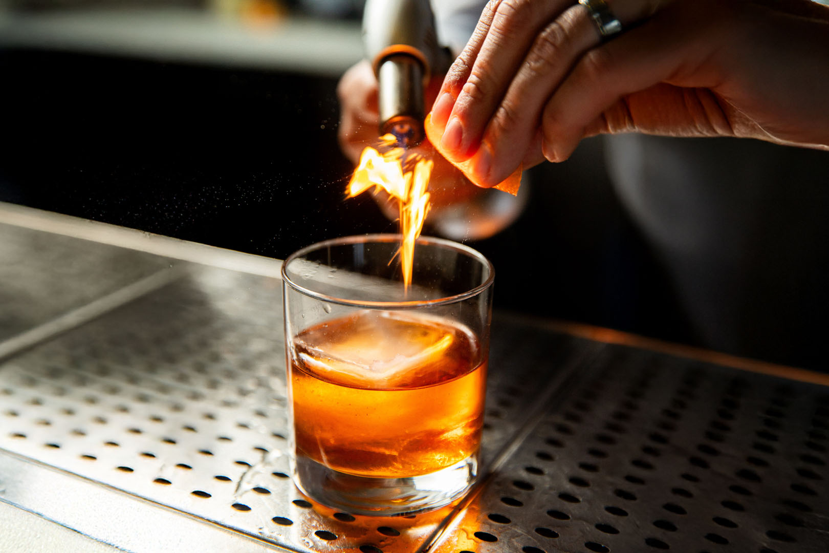 Blackened Swordfish, green rice and a glass of wine