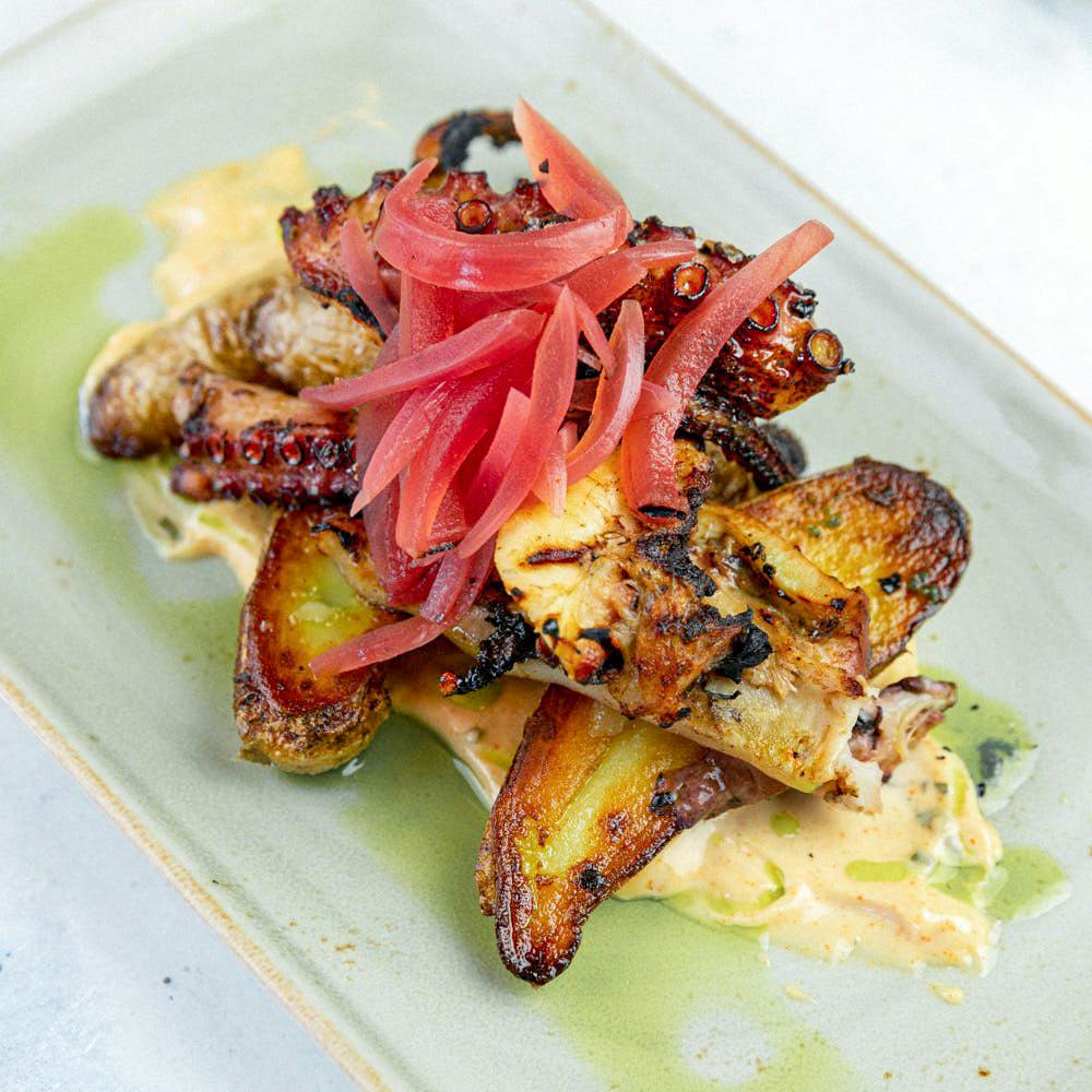 Grilled Octopus, Potatoes, smoked paprika aioli and pickled onion