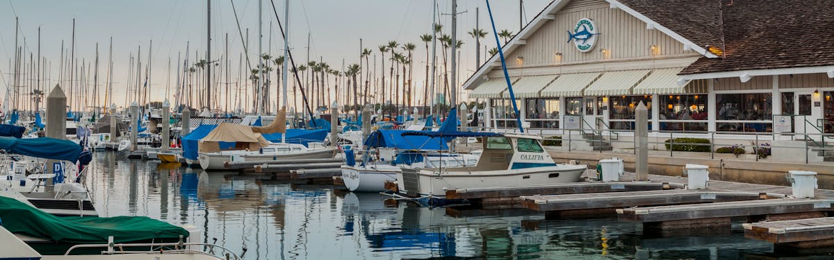 Bluewater Redondo exterior view of on the water surrounded by boats and trees