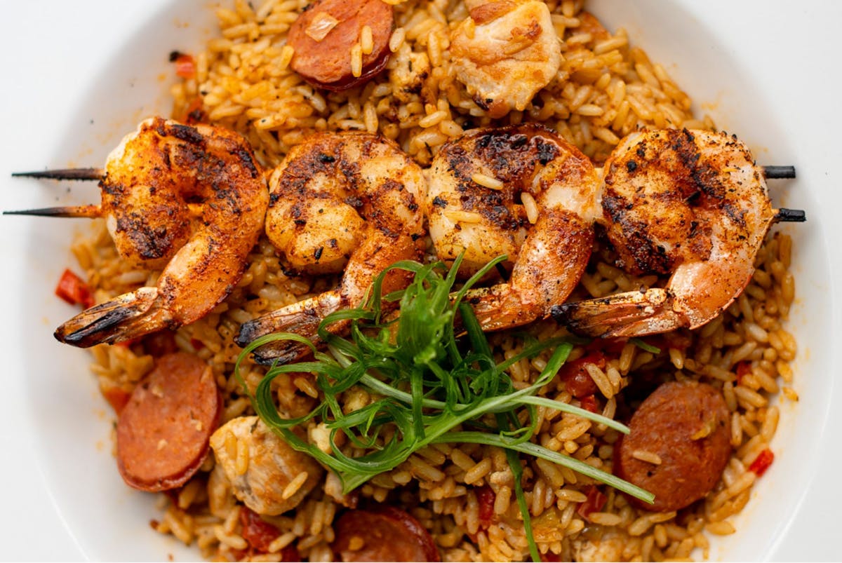 Jambalaya with skewered shrimp