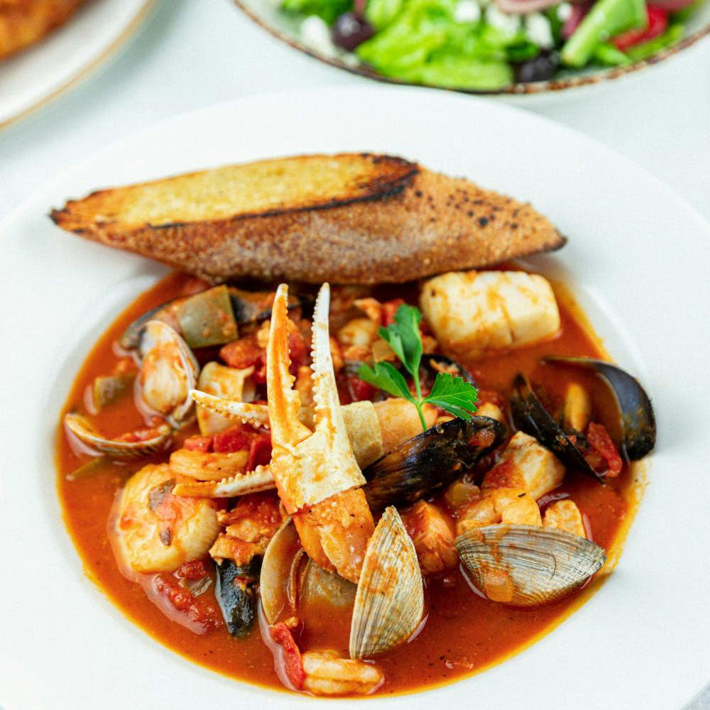 clams, mussels, crabmeat, shrimp, scallops and fish in marinara sauce