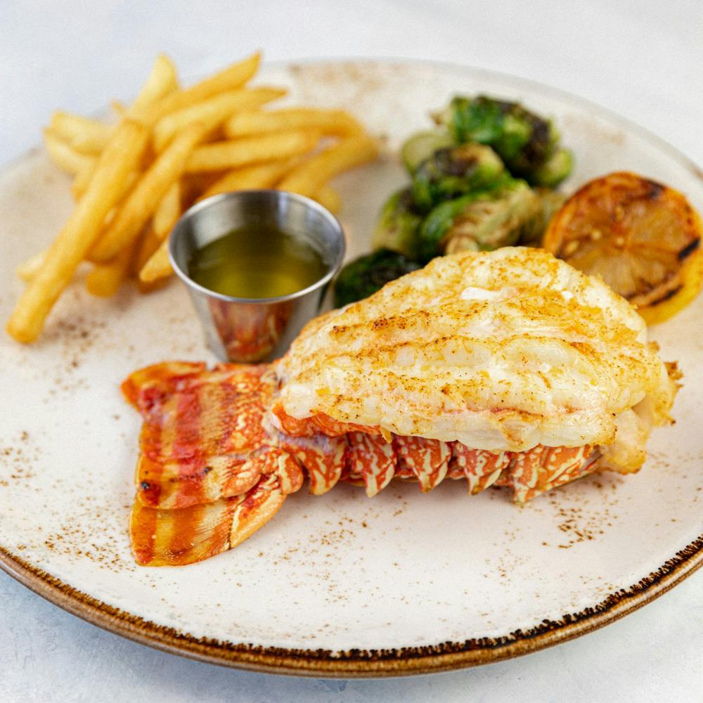 Lobster Tail, French Fries, Greens