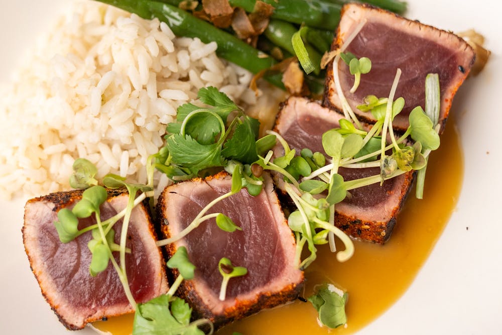 Togarashi Spiced Ahi Tuna with rice and beans.