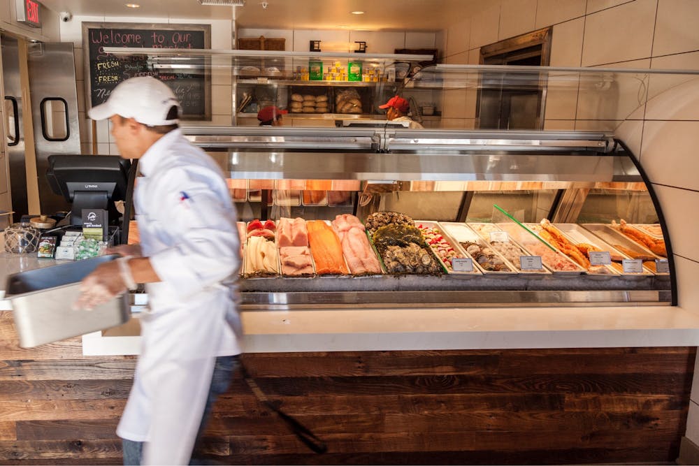 a man preparing food inside of it