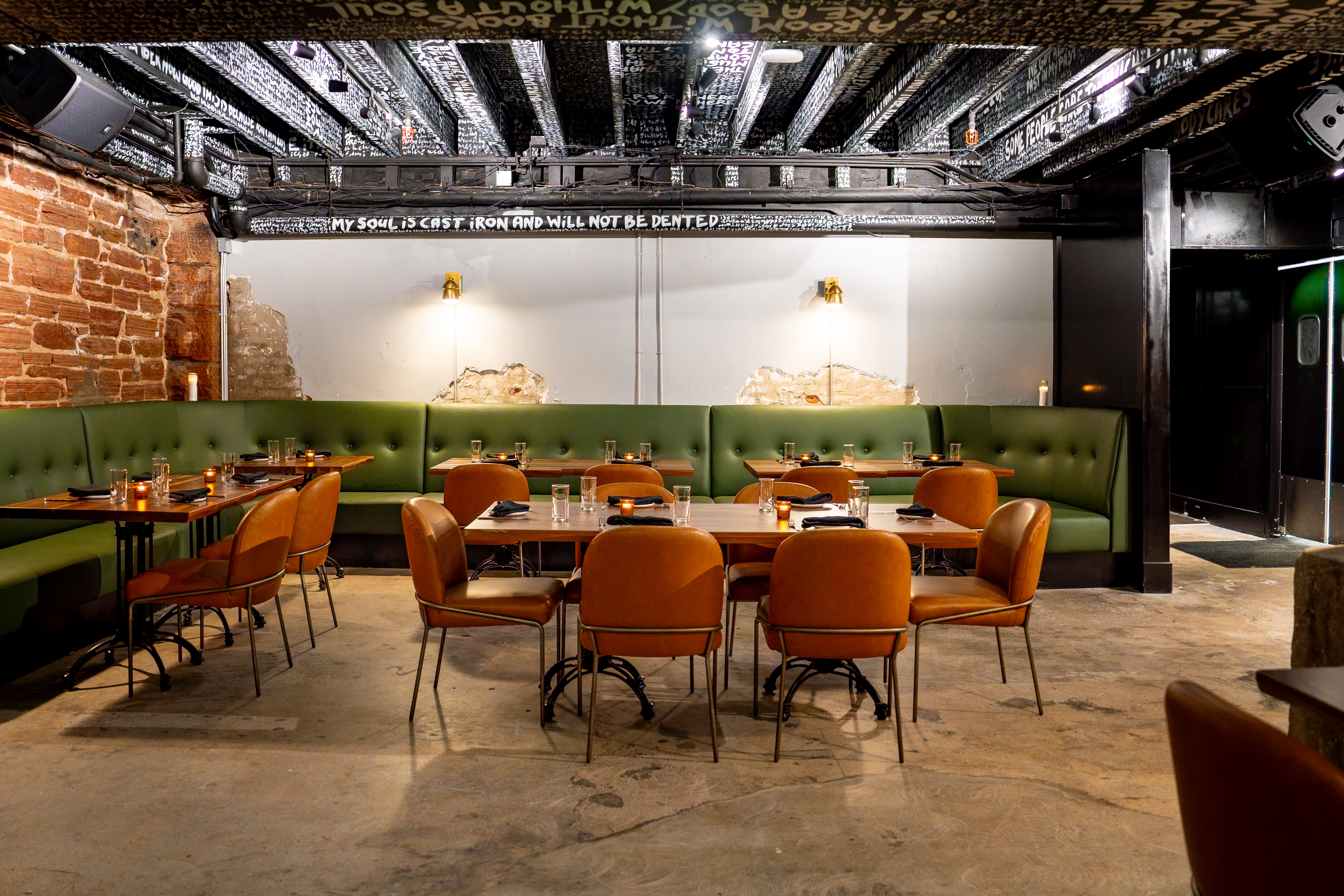a group of people sitting at a table in a room
