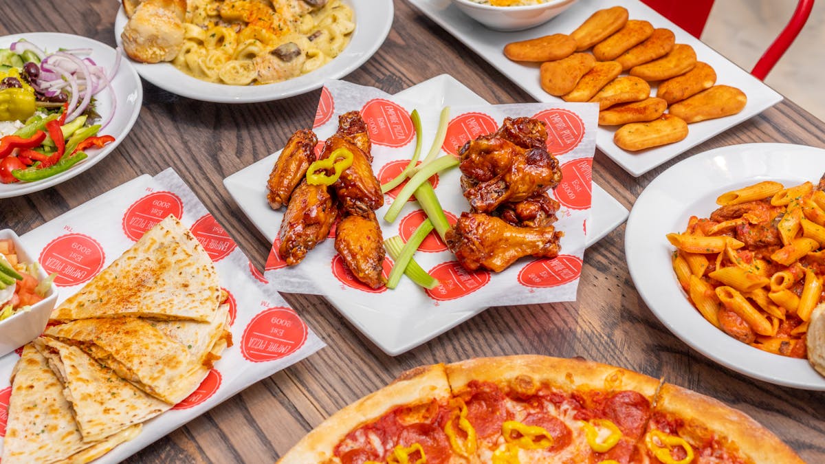 a bunch of food on a plate on a table