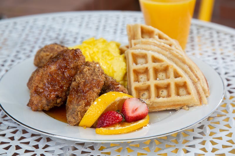 a plate of food and a cup of coffee