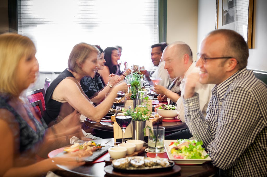 People dining at The Tavern at American Bounty on the CIA campus in the Hudson Valley, NY.