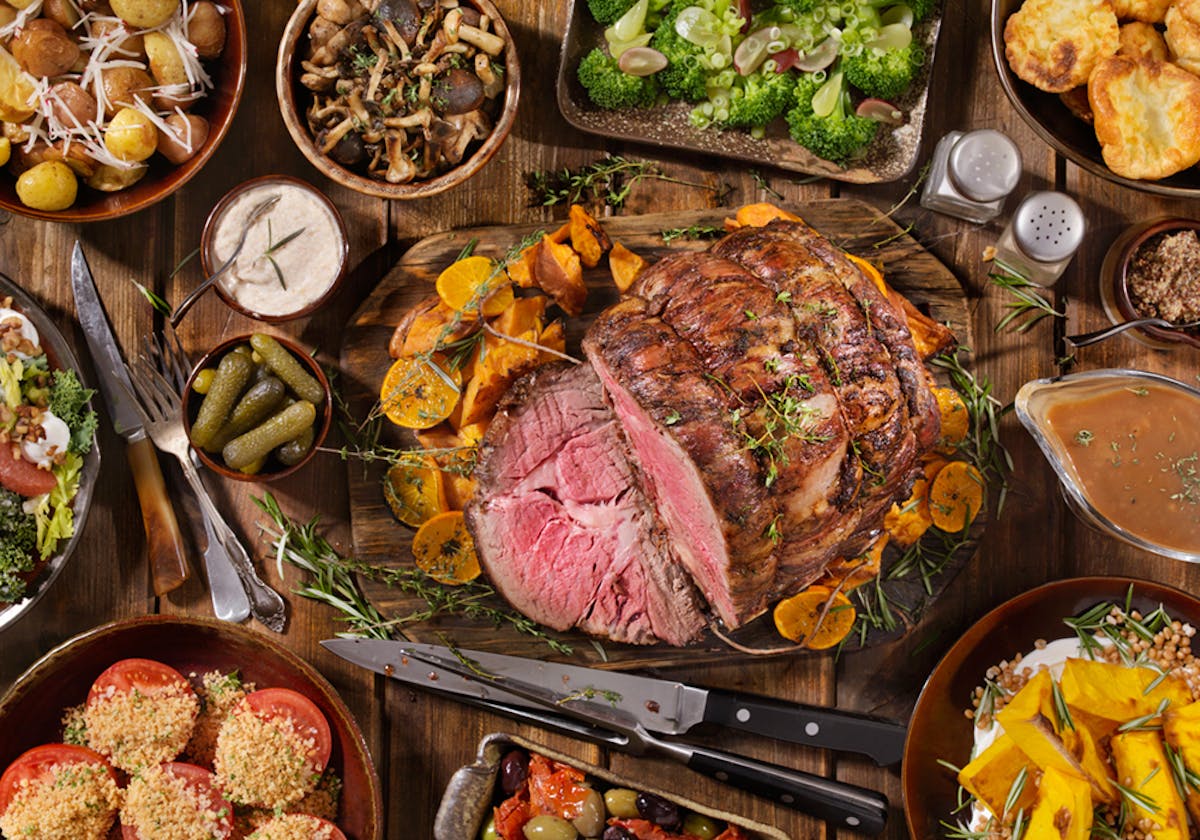 a close up of many different types of food on a table