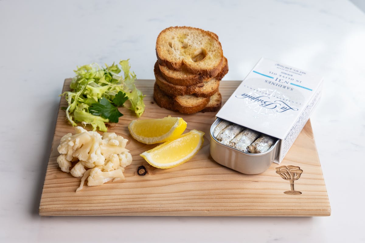 Ahi tartare and artisan cheese board at Crush’d Wine Bar + Kitchen