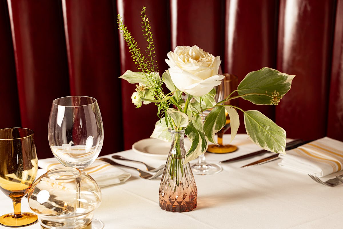 a vase of flowers on a table