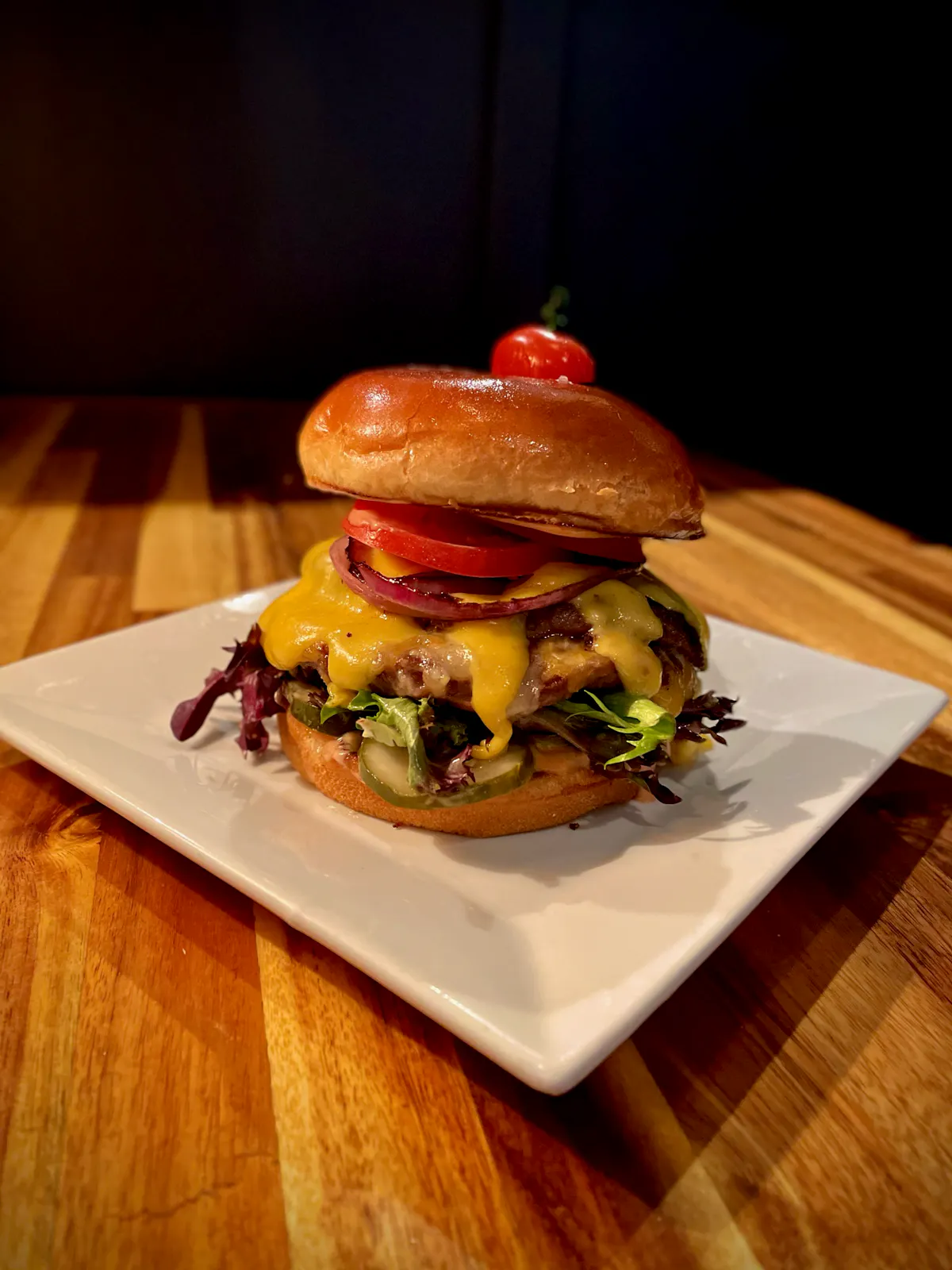 a sandwich sitting on top of a wooden table