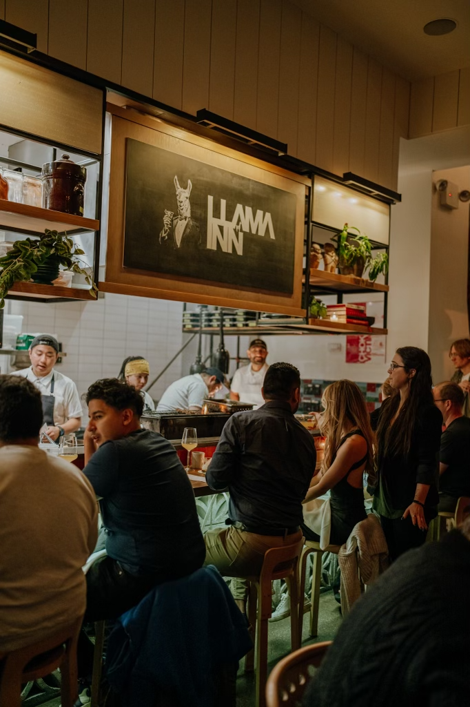 a group of people standing in a room