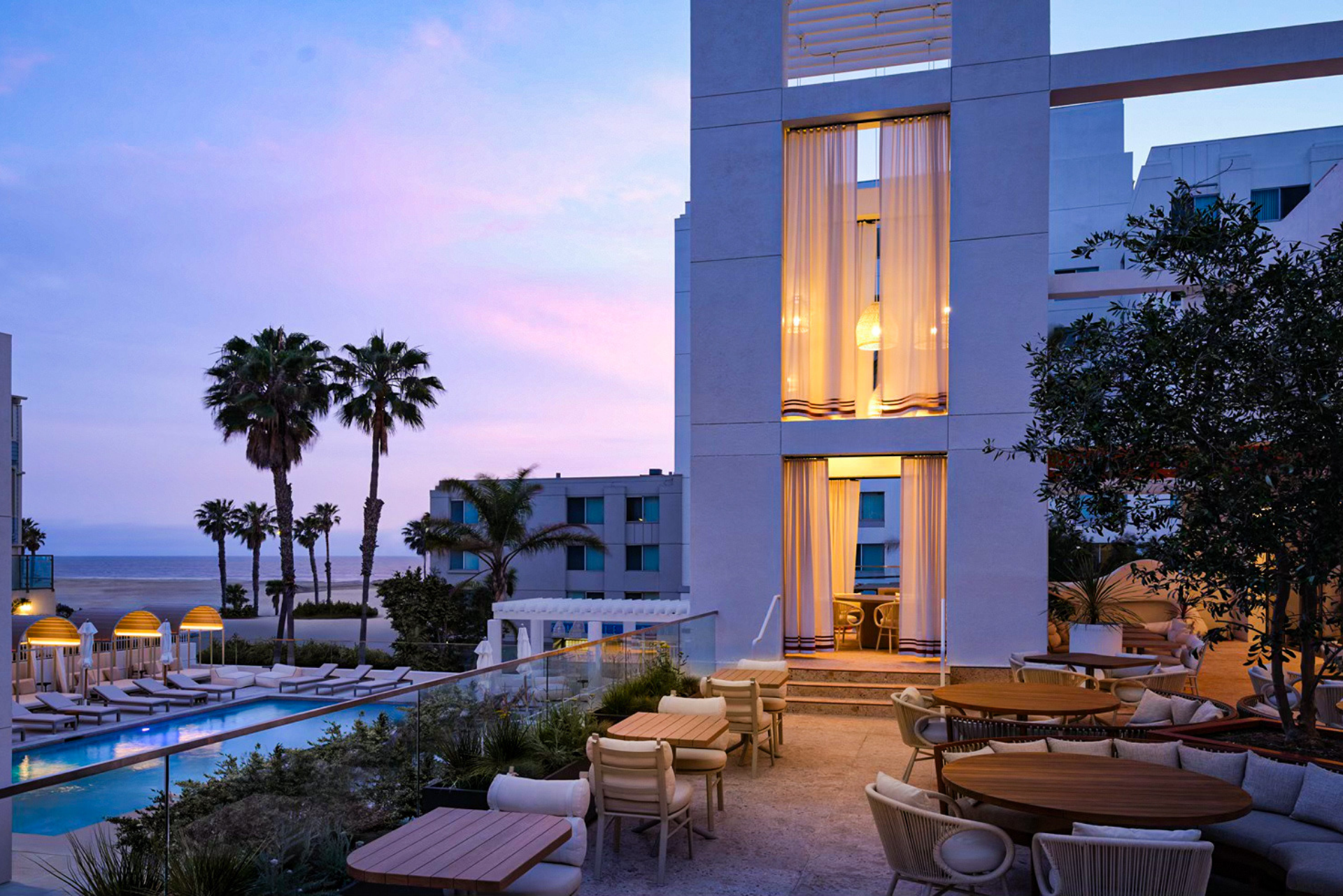 a building with tables and chairs outside