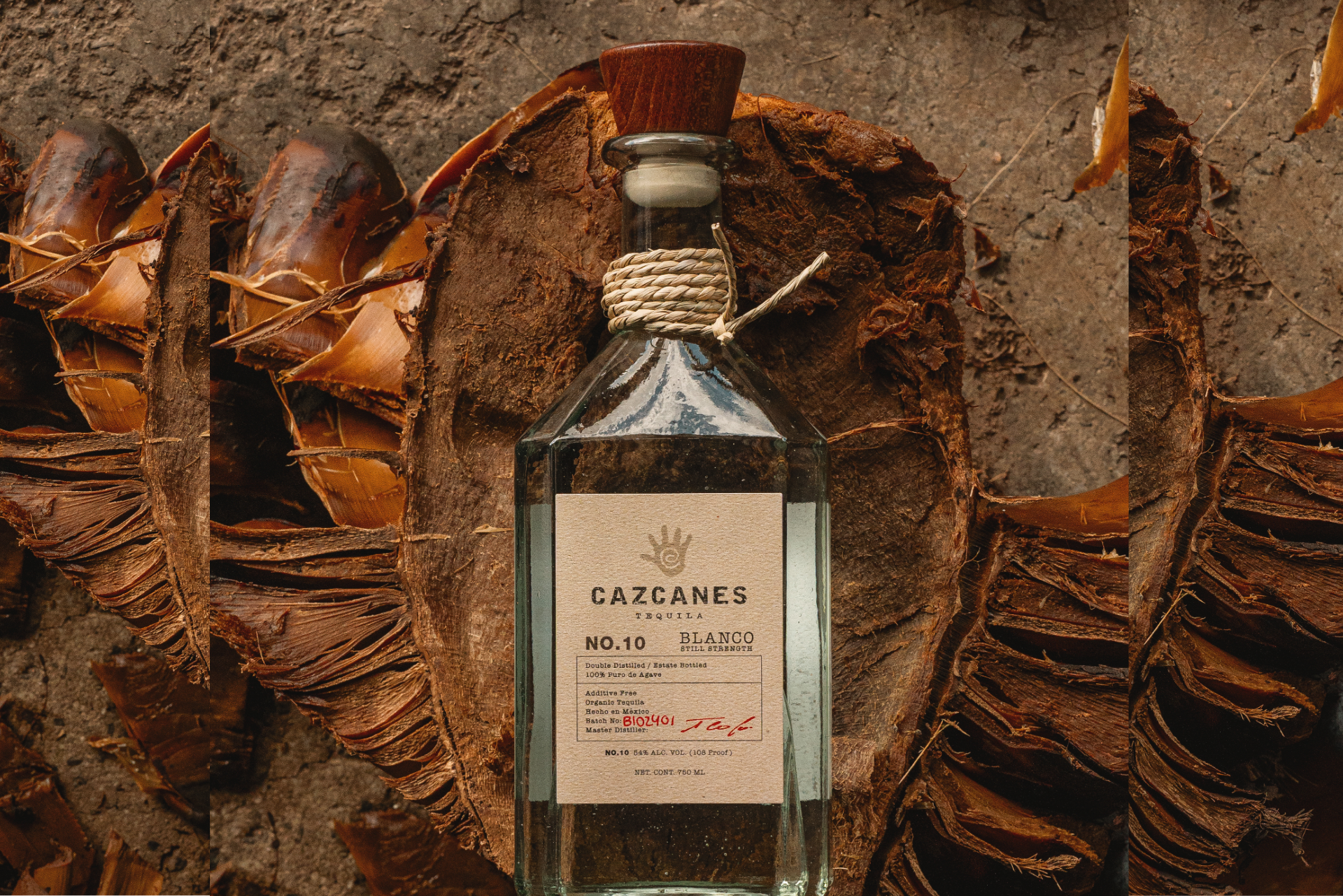 a bottle of alcohol on a piece of coconut