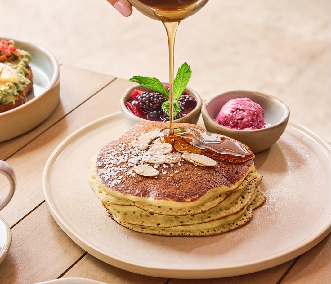 a table topped with plates of food on a plate