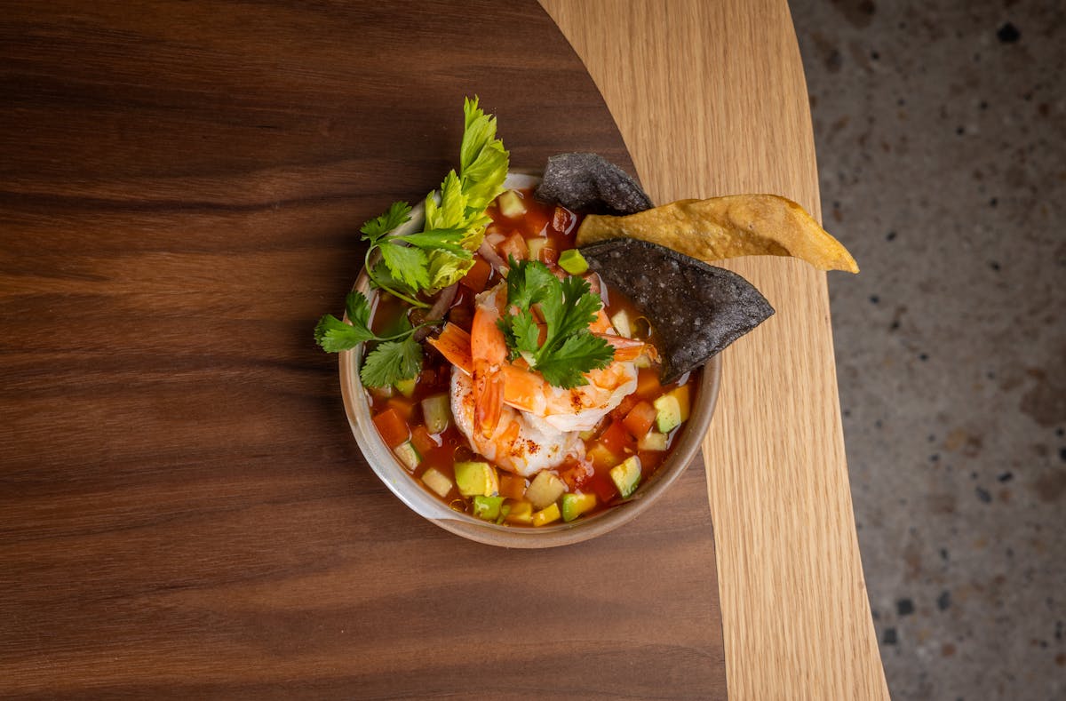 a plate of food on a wooden table