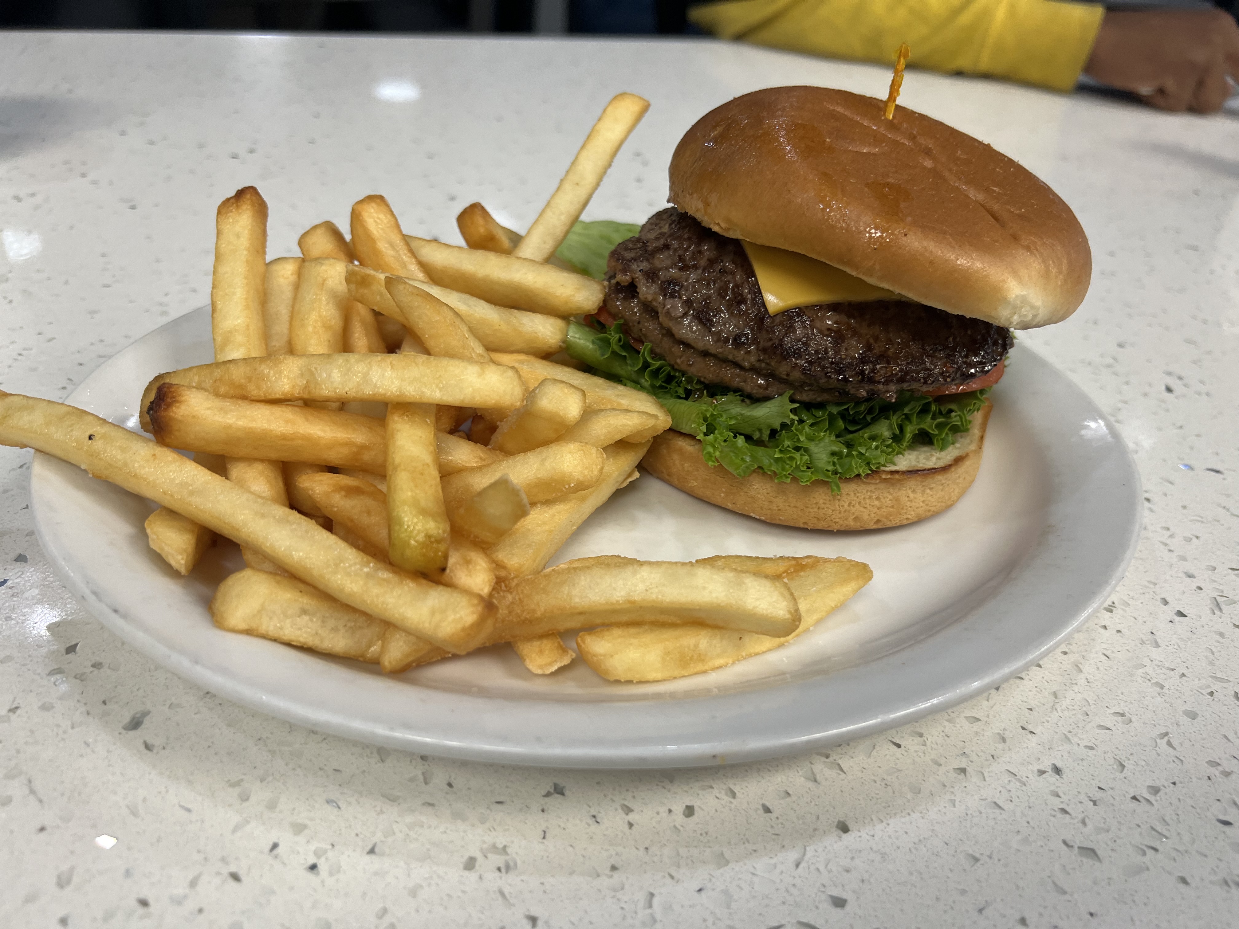 a sandwich and fries on a plate