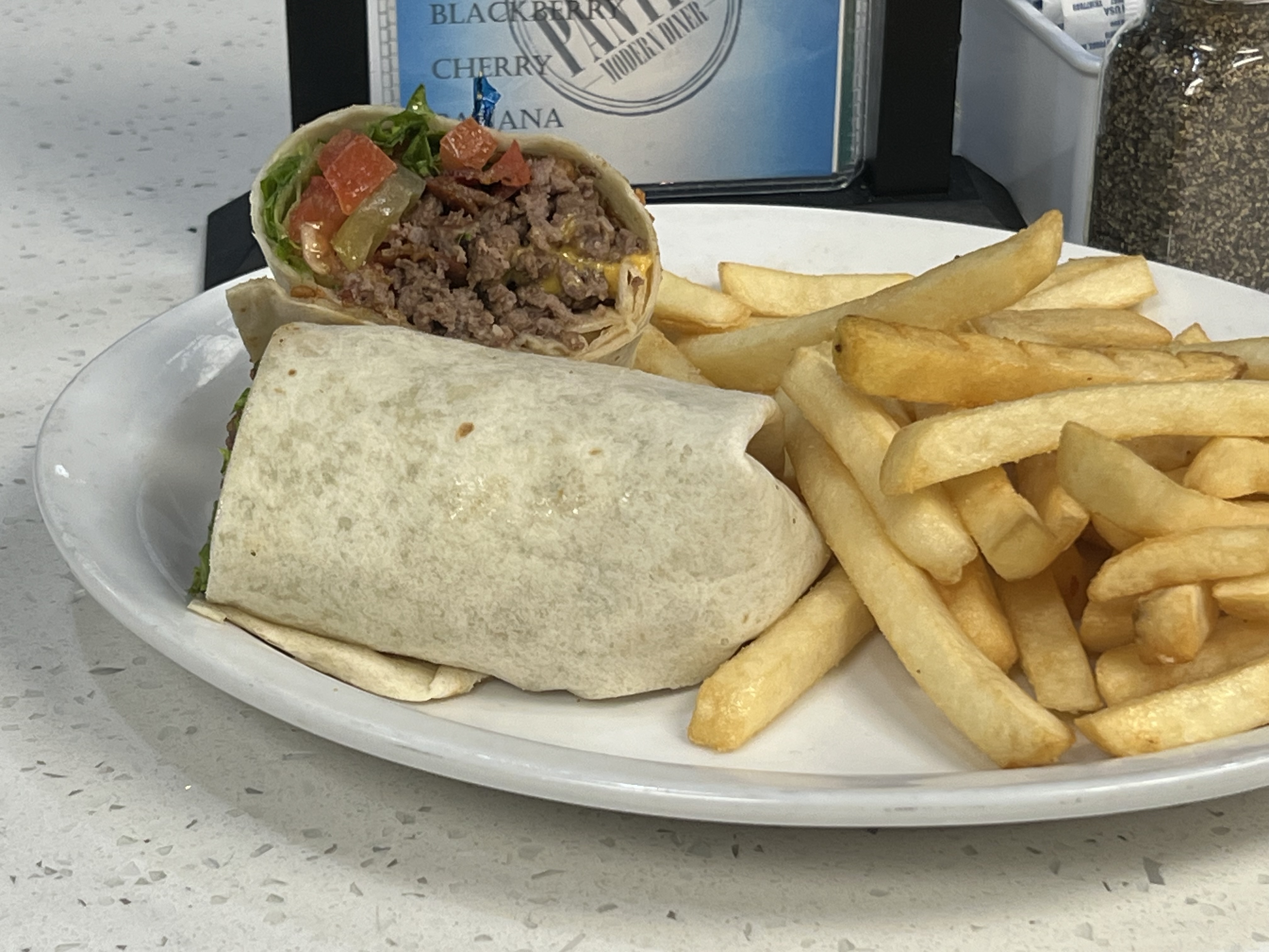 a sandwich and fries on a plate