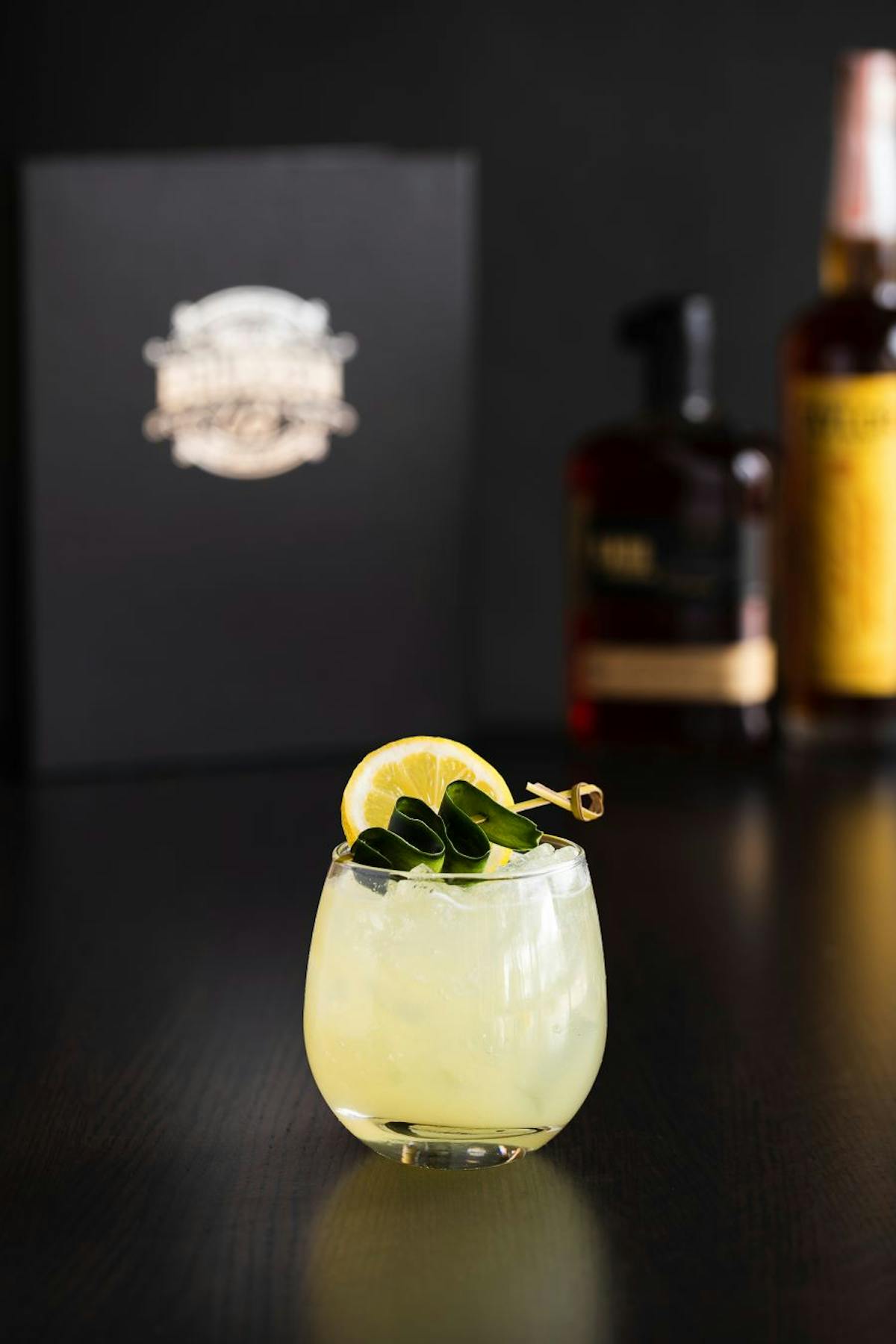 a banana sitting next to a glass of wine