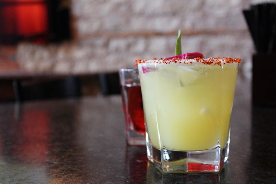a glass cup on a table