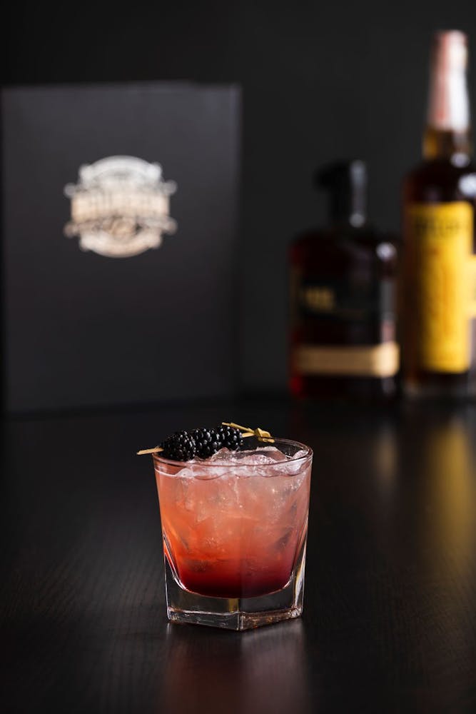 a glass bottle sitting on a table