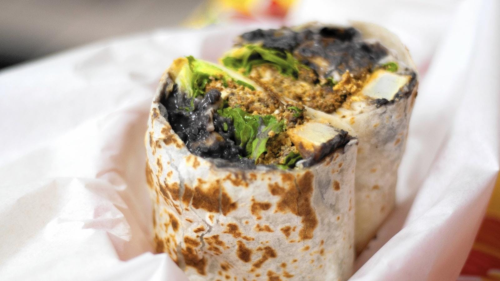 a close up of a burrito