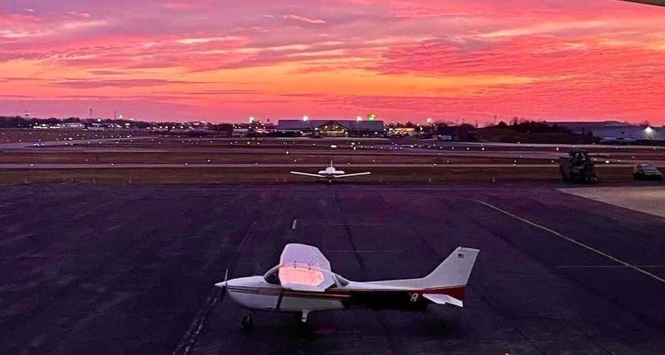 a plane sitting on top of a runway