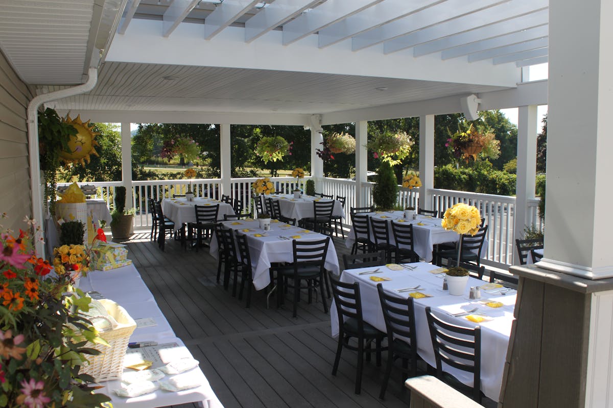 a dining room table in front of a building