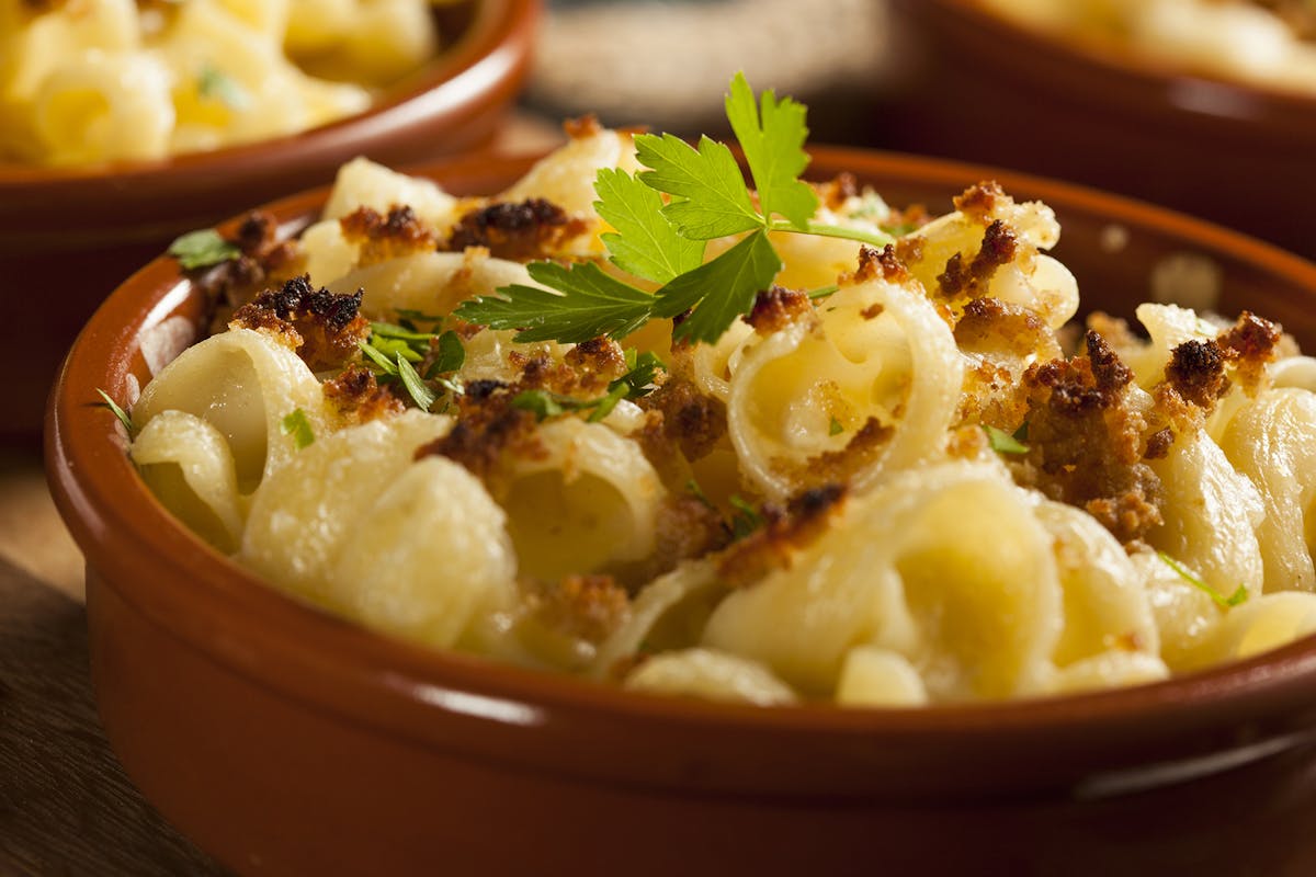 a close up of a bowl of food on a plate