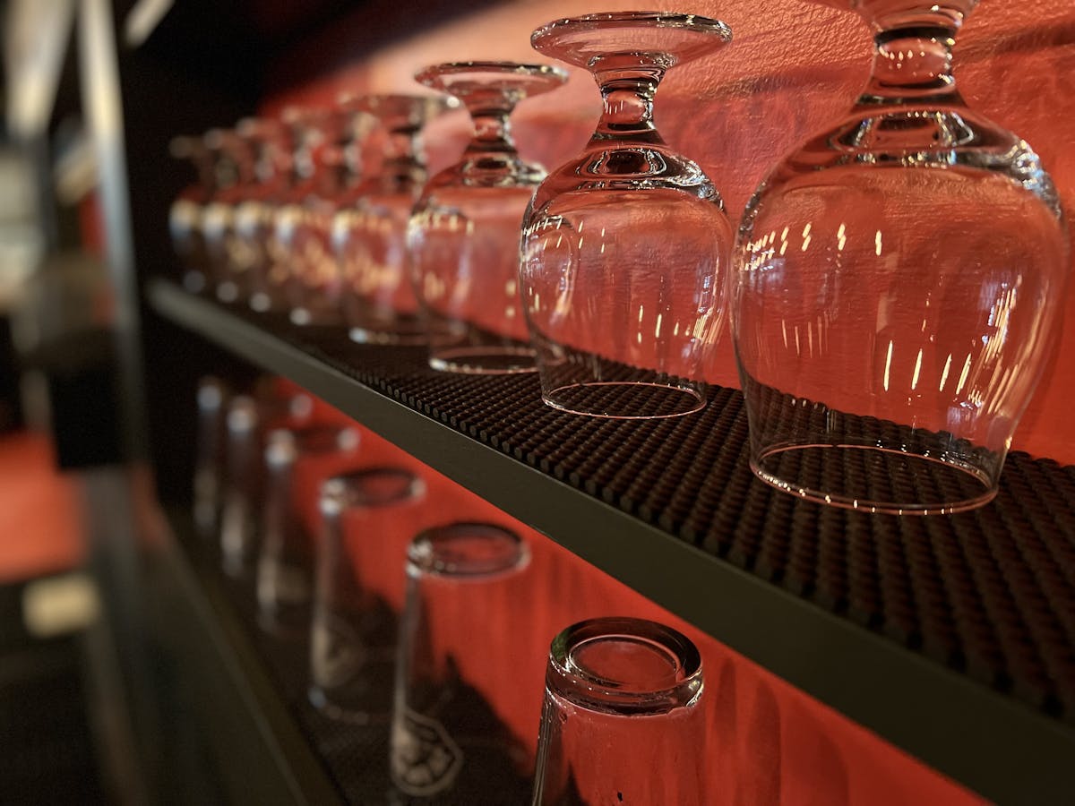 a shelf with clean glasses