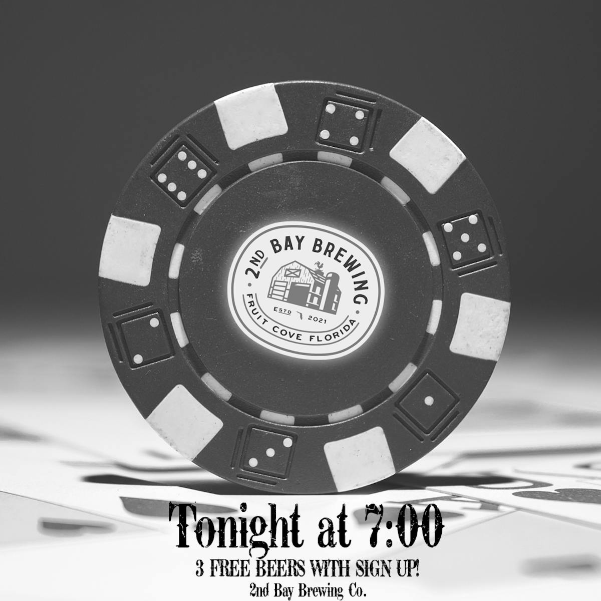 A poker chip sitting upright with the 2nd Bay logo