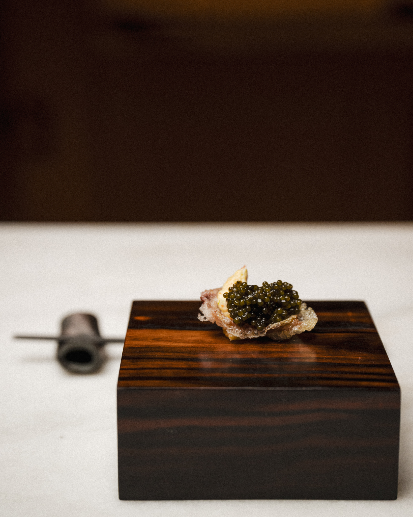 a piece of cake sitting on top of a wooden table