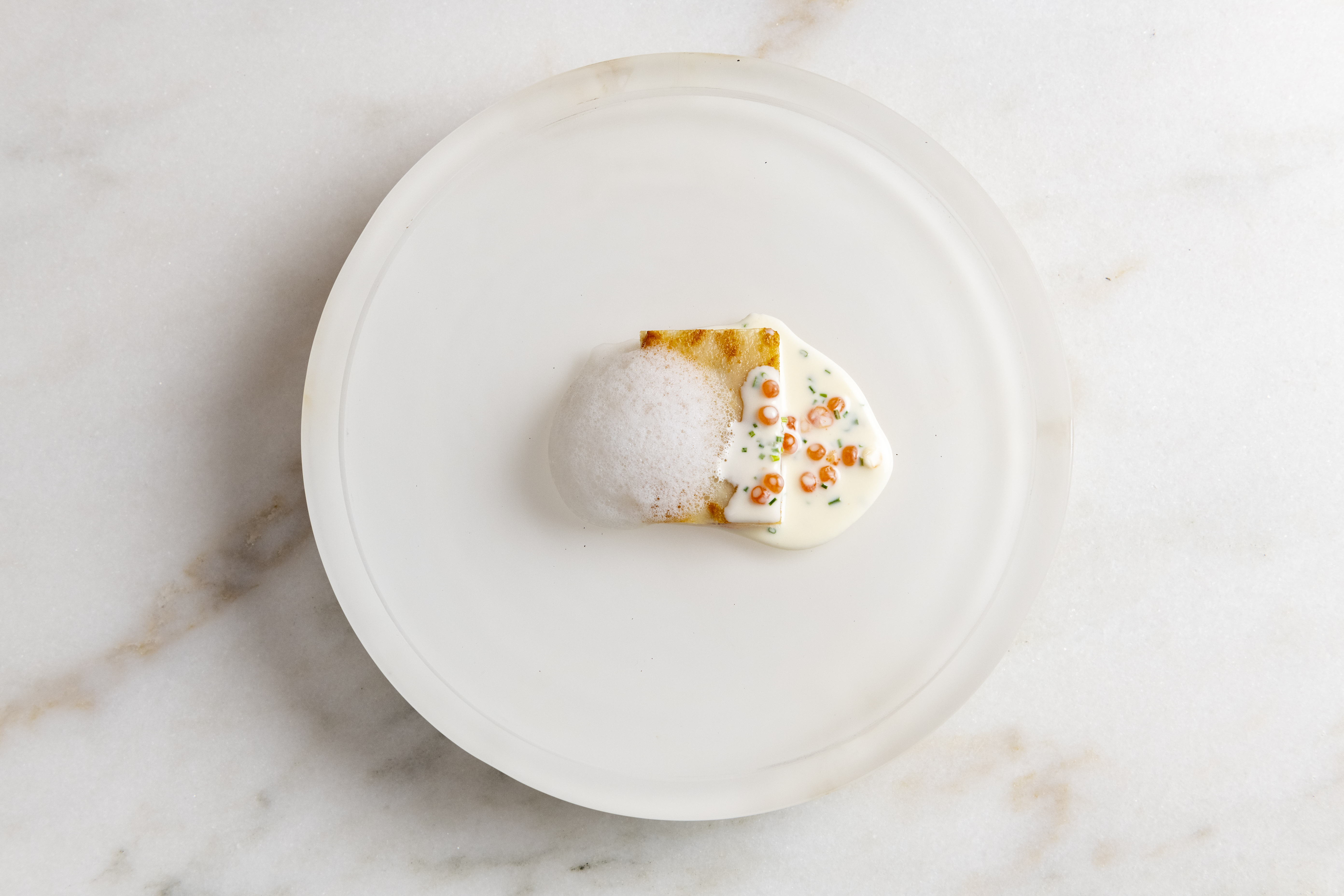 a half eaten piece of cake on a plate