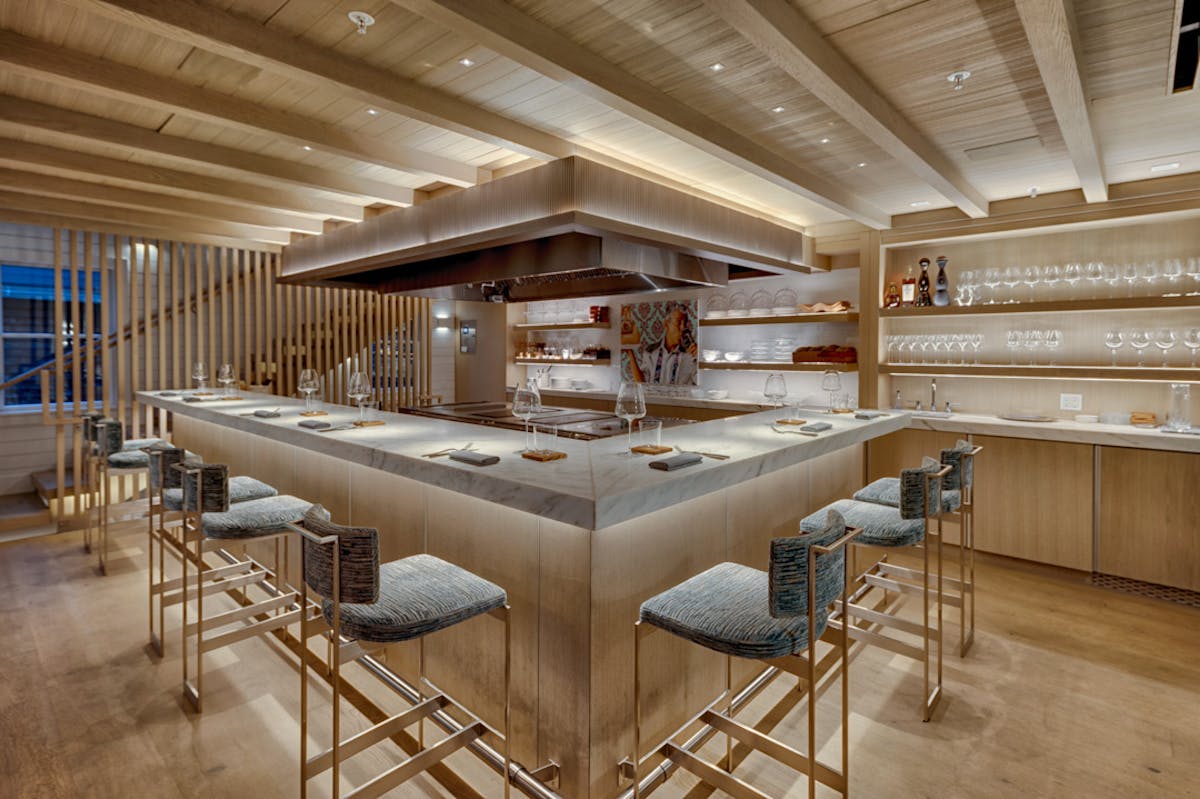 a room filled with furniture and a table