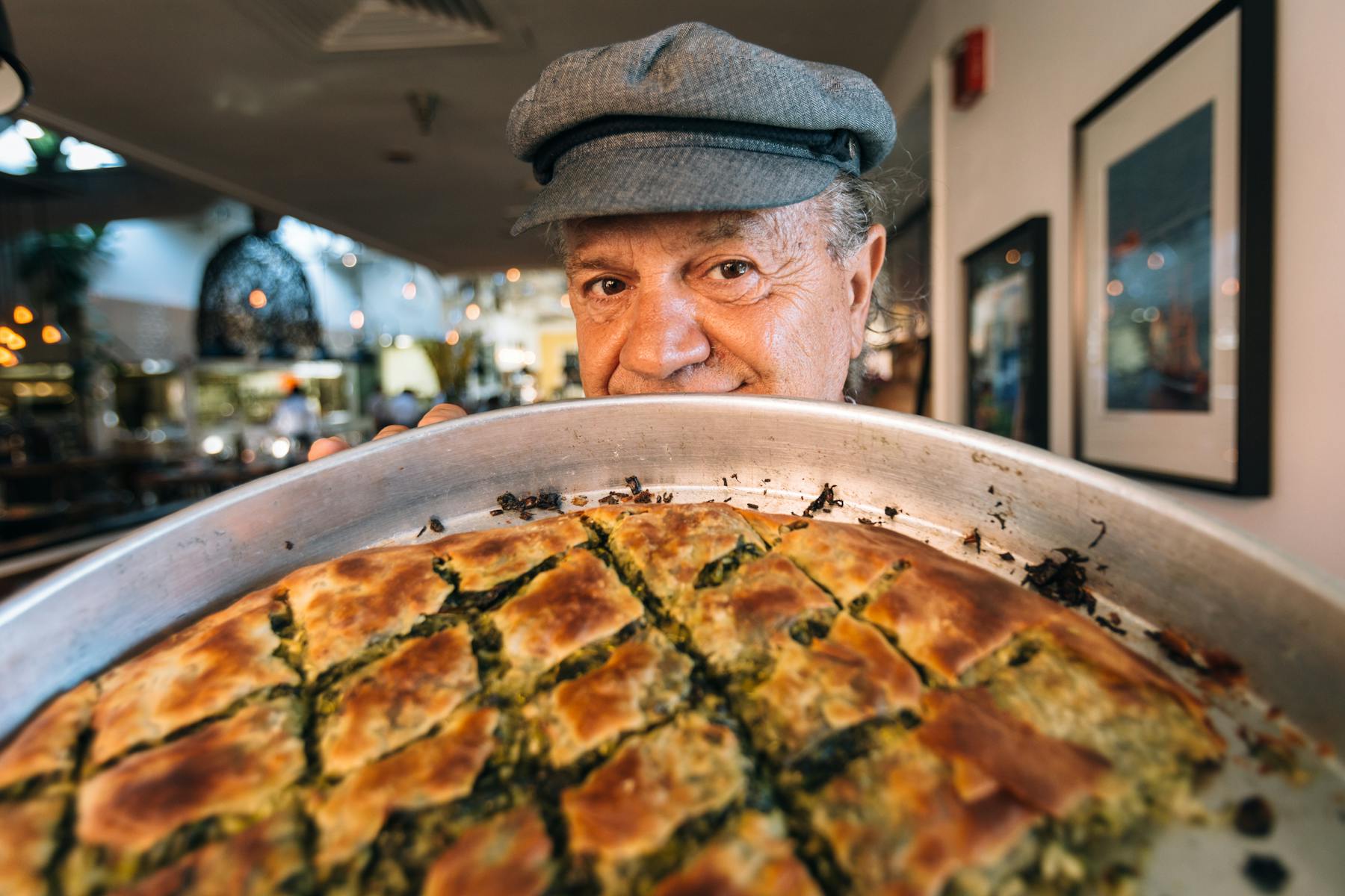 a person with a slice of pizza