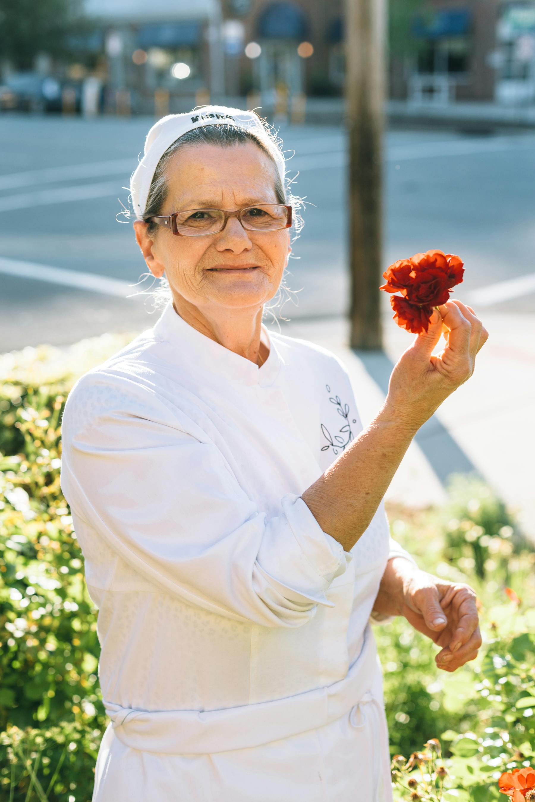 a person holding a flower