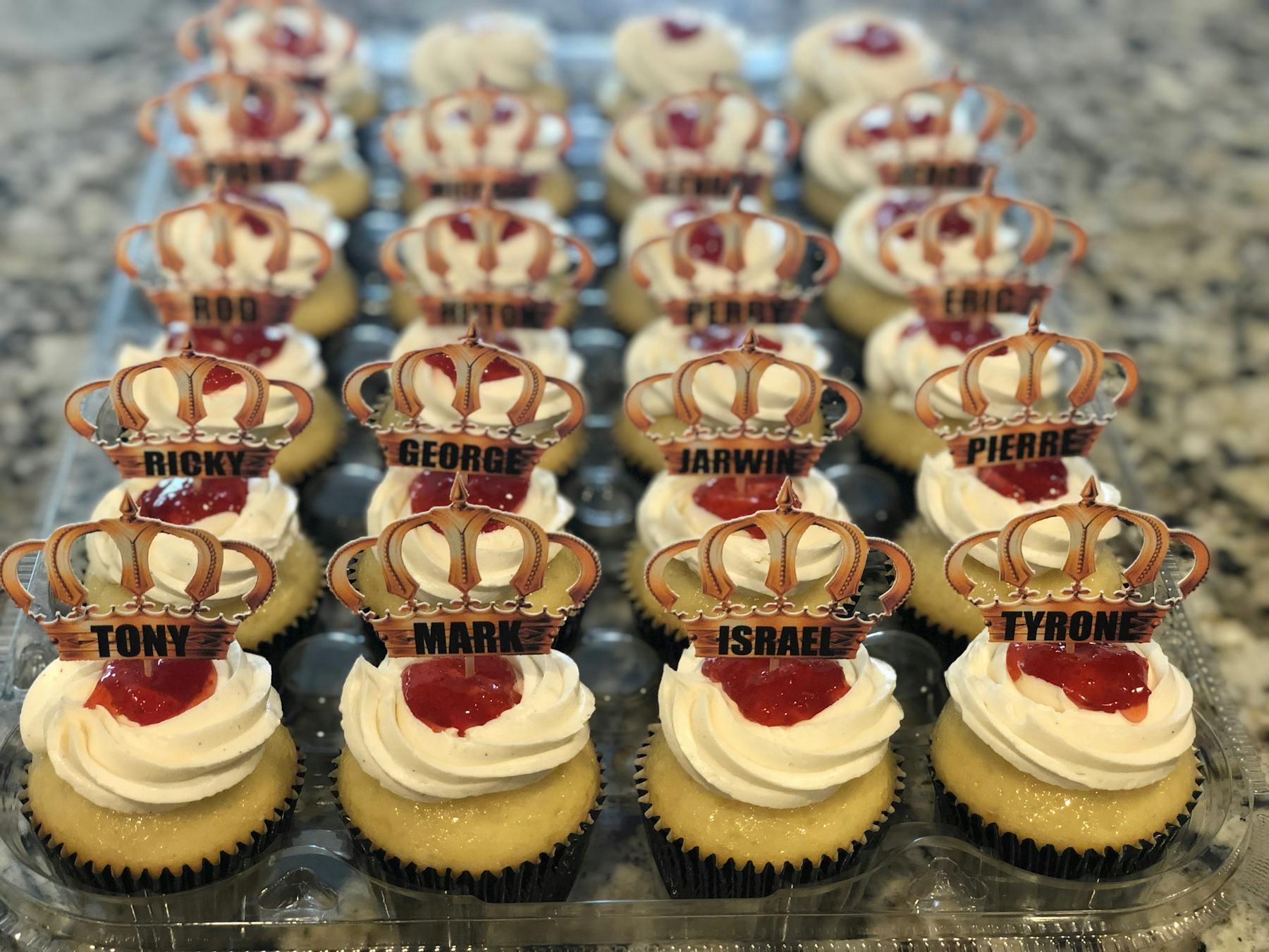 a tray of cupcakes