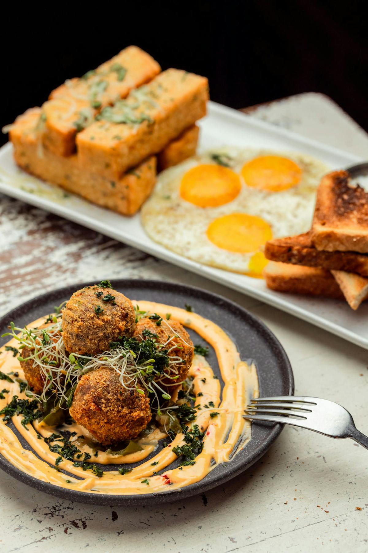 a plate of food with a fork