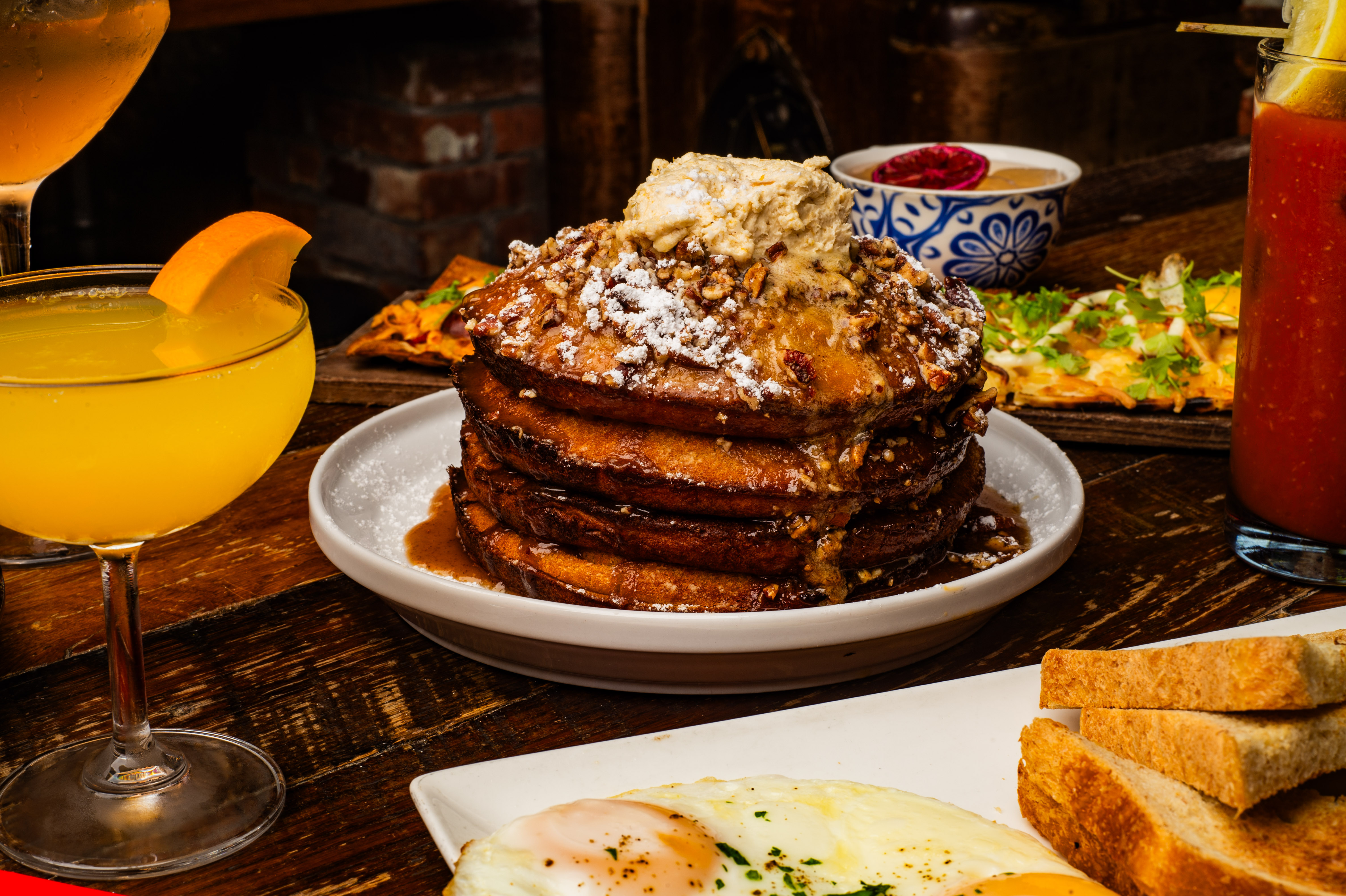 a plate of food with a slice of cake on a table