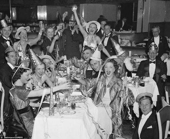 a vintage new years eve party with guests cheering