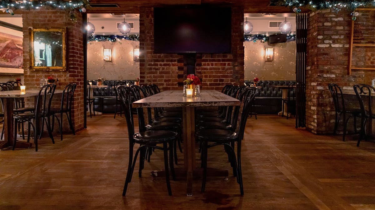 a dining room table in front of a building