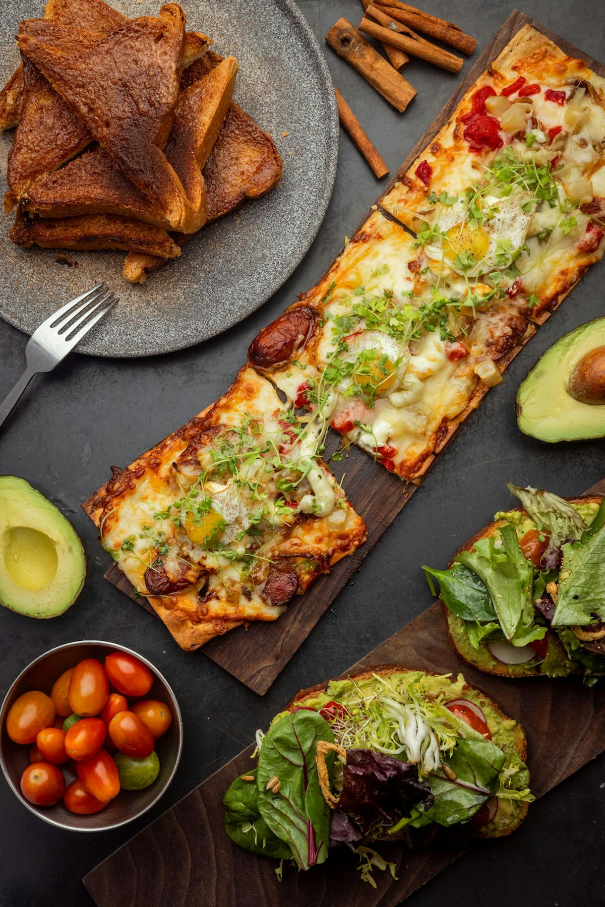 a plate of food with a slice of pizza