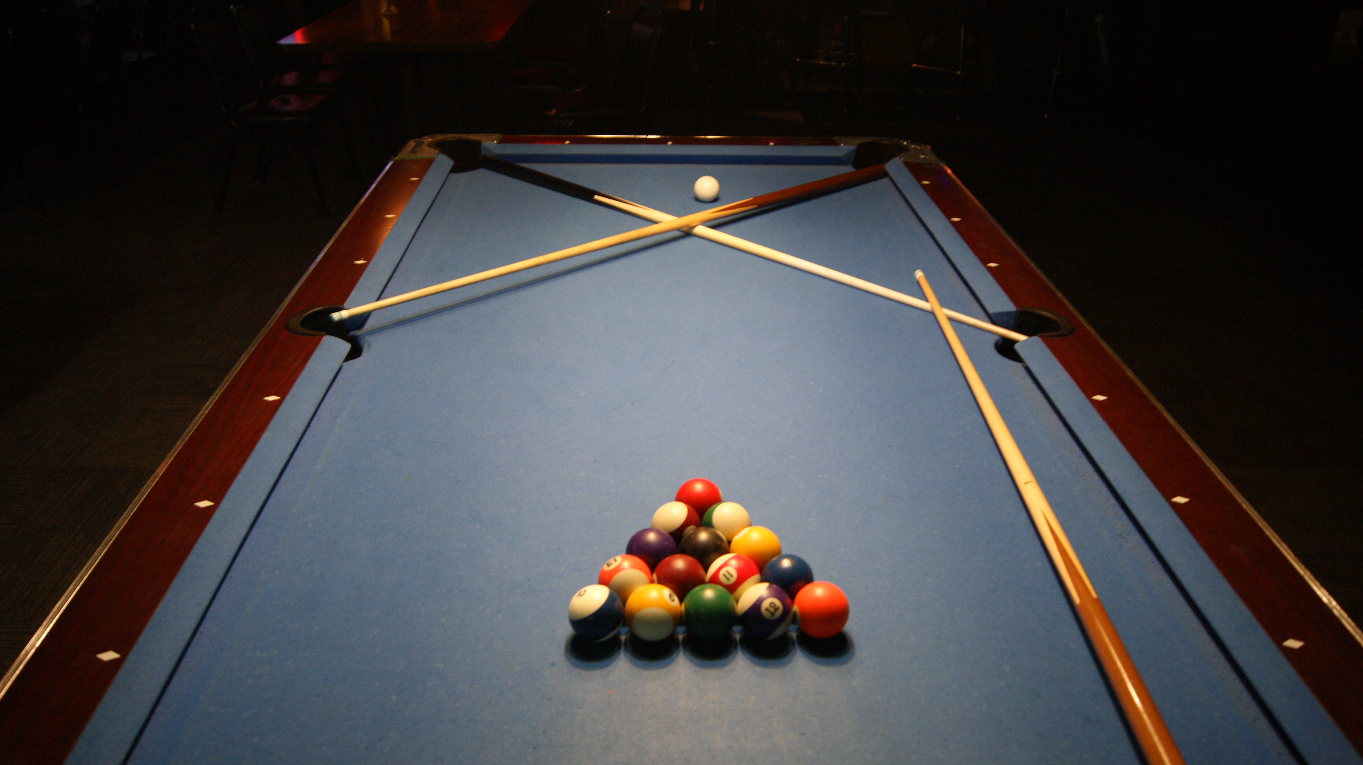 a table with a ball in a room