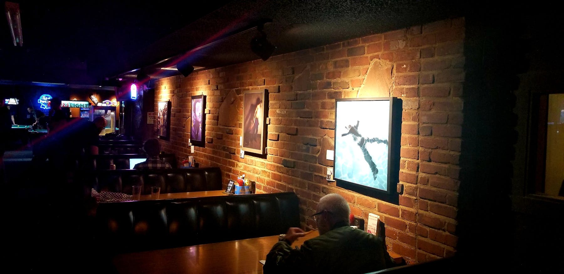 a person standing in front of a fireplace