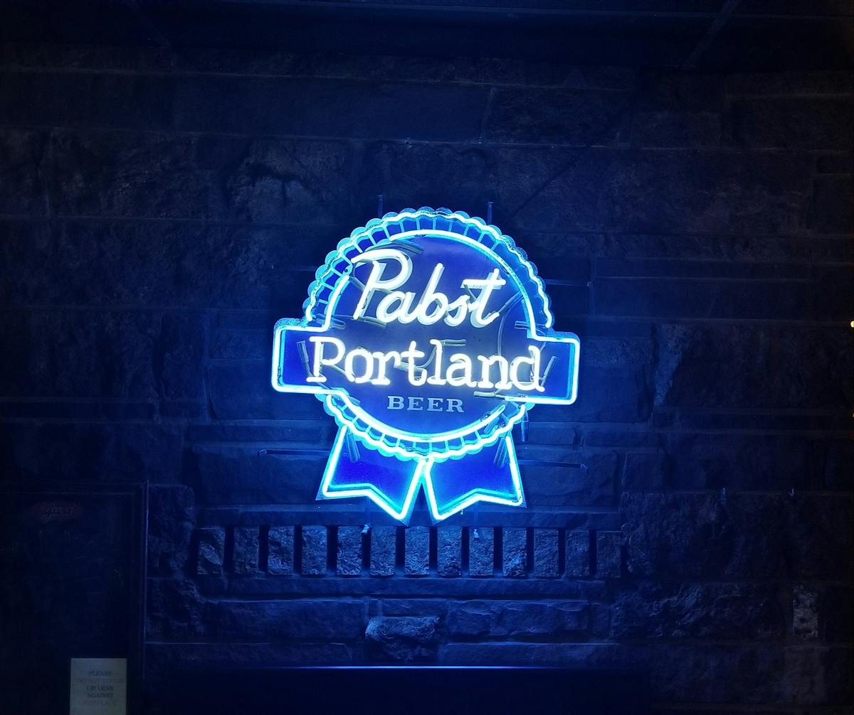 a blackboard sign outside of a building