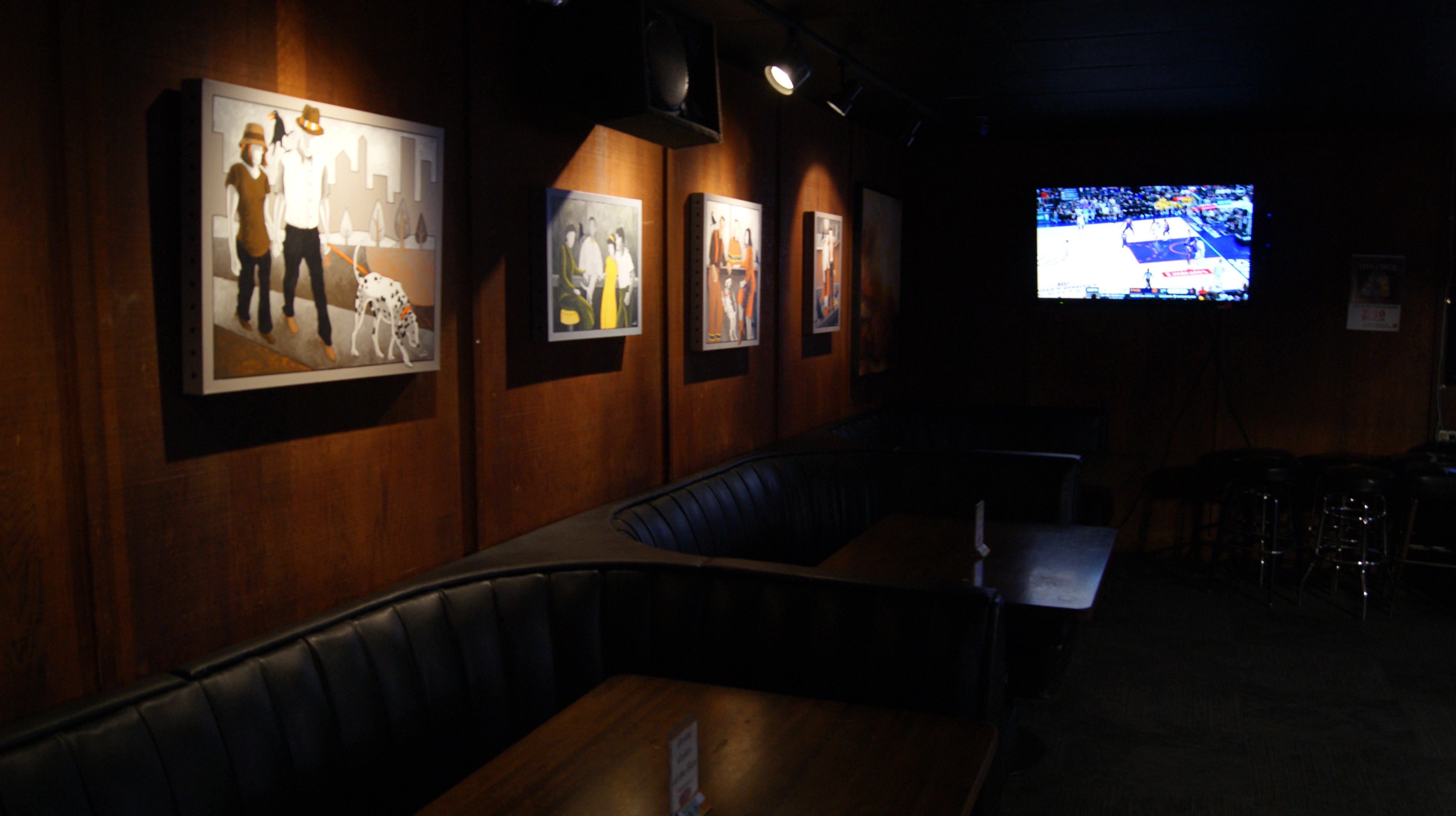 a flat screen television in a dark room