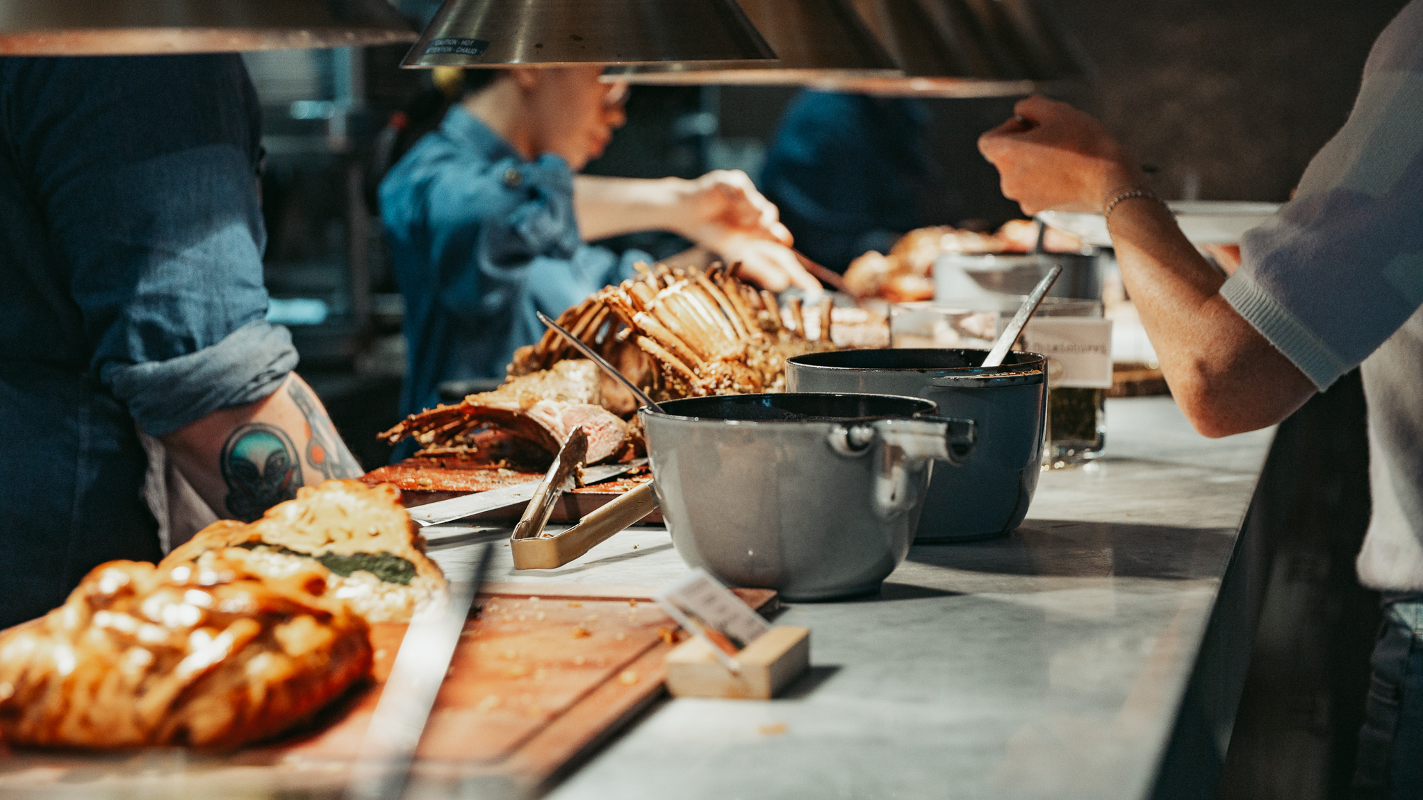 a person cooking food on a table