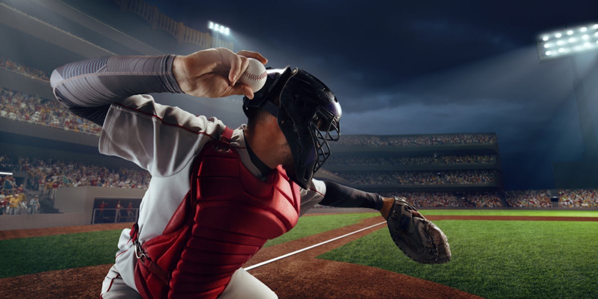 Baseball catcher throwing a baseball