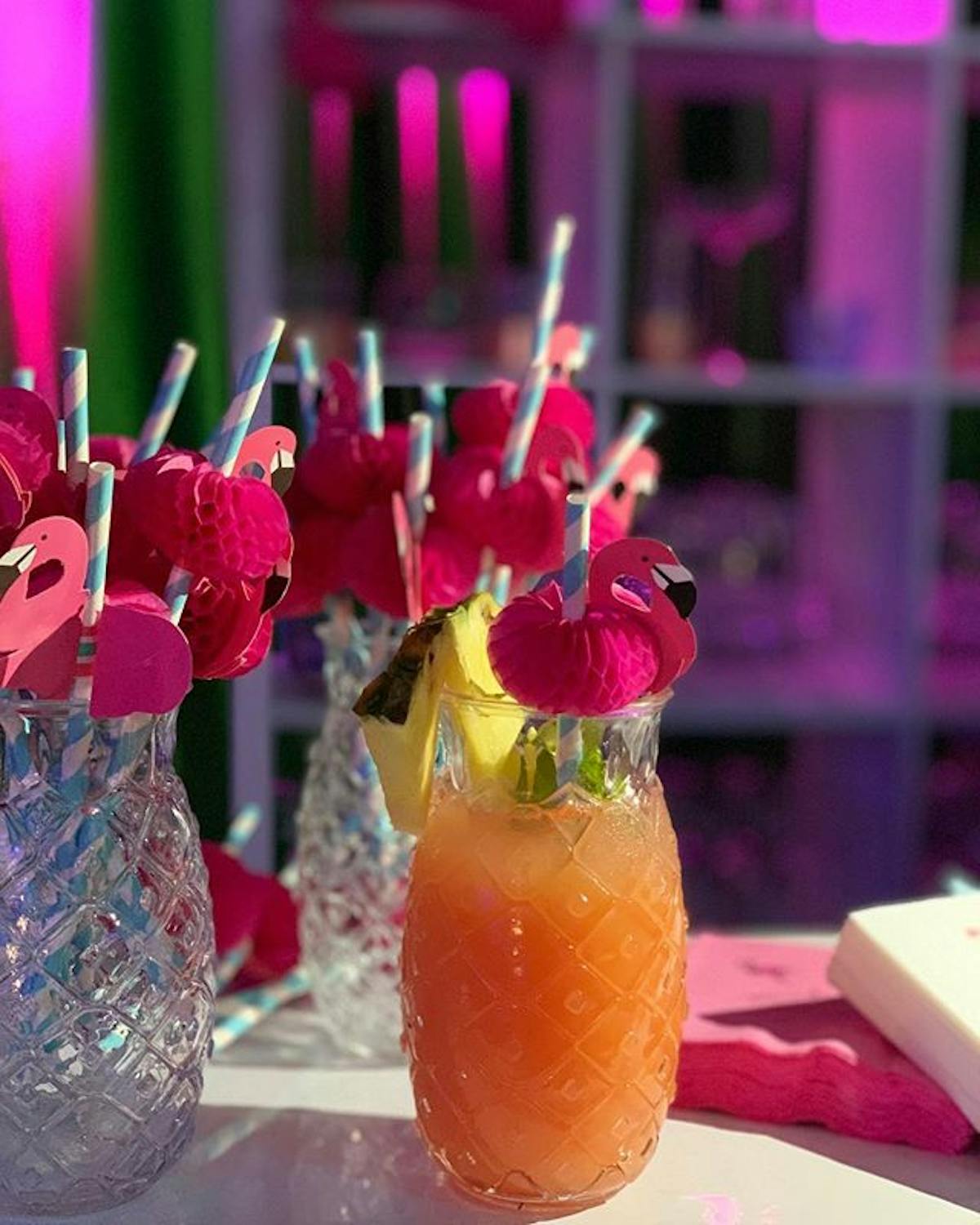 a close up of a flower vase on a table